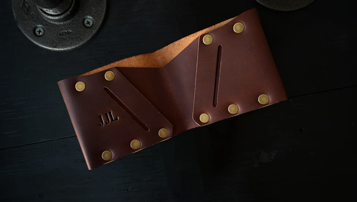 Bill fold Wallet personalized with embossed initials, shown as J J L.