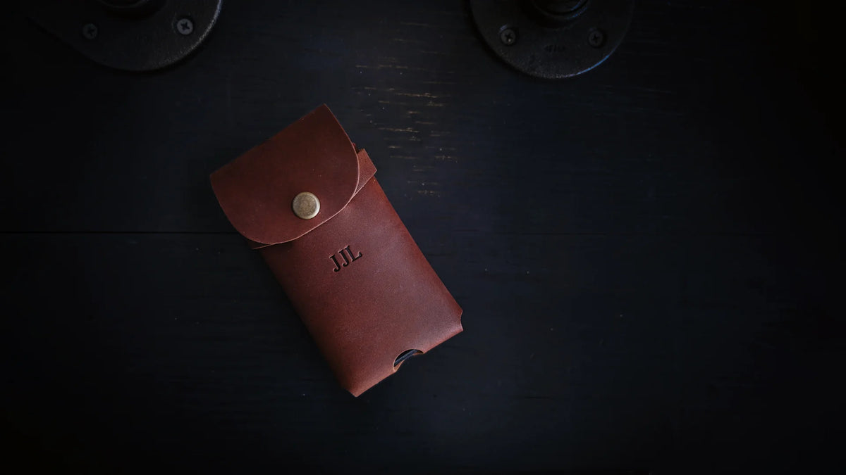 personalized cell phone holster personalized with embossed initials, shown as J J L.