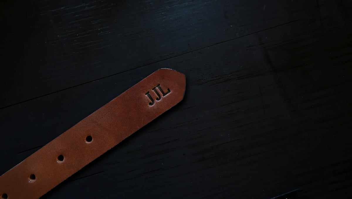 Everyday Belt personalized with embossed initials, shown as J J L.