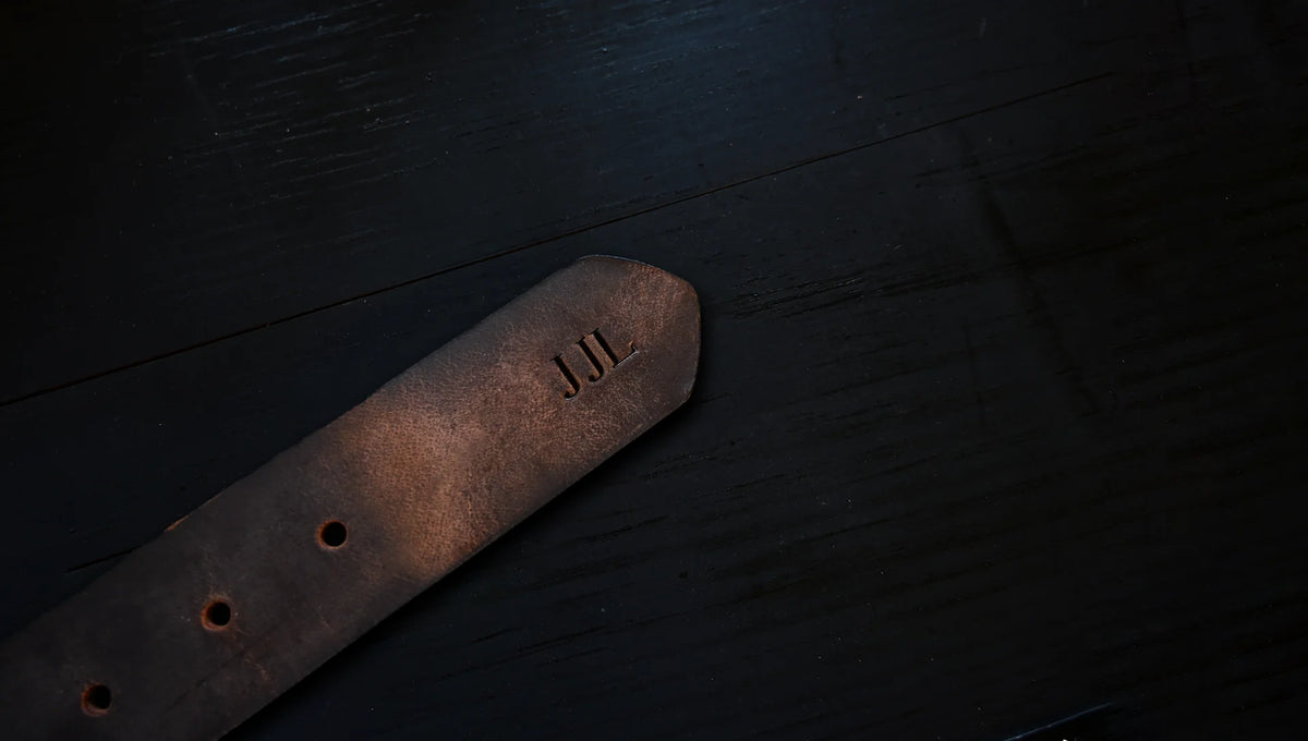 journeyman's belt personalized with embossed initials, shown as J J L.