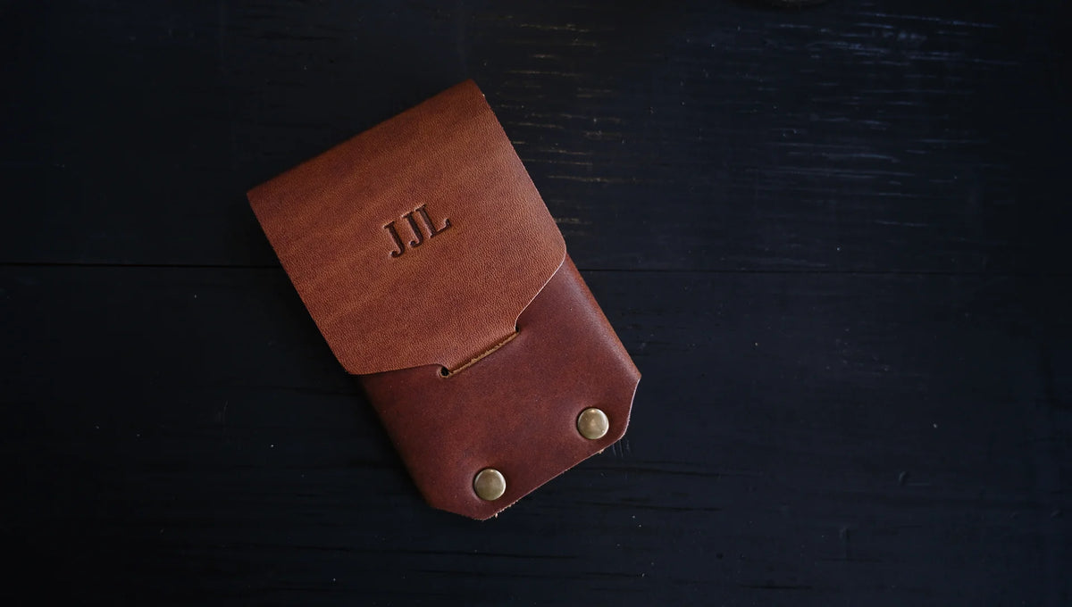 personalized revere wallet personalized with embossed initials, shown as J J L.